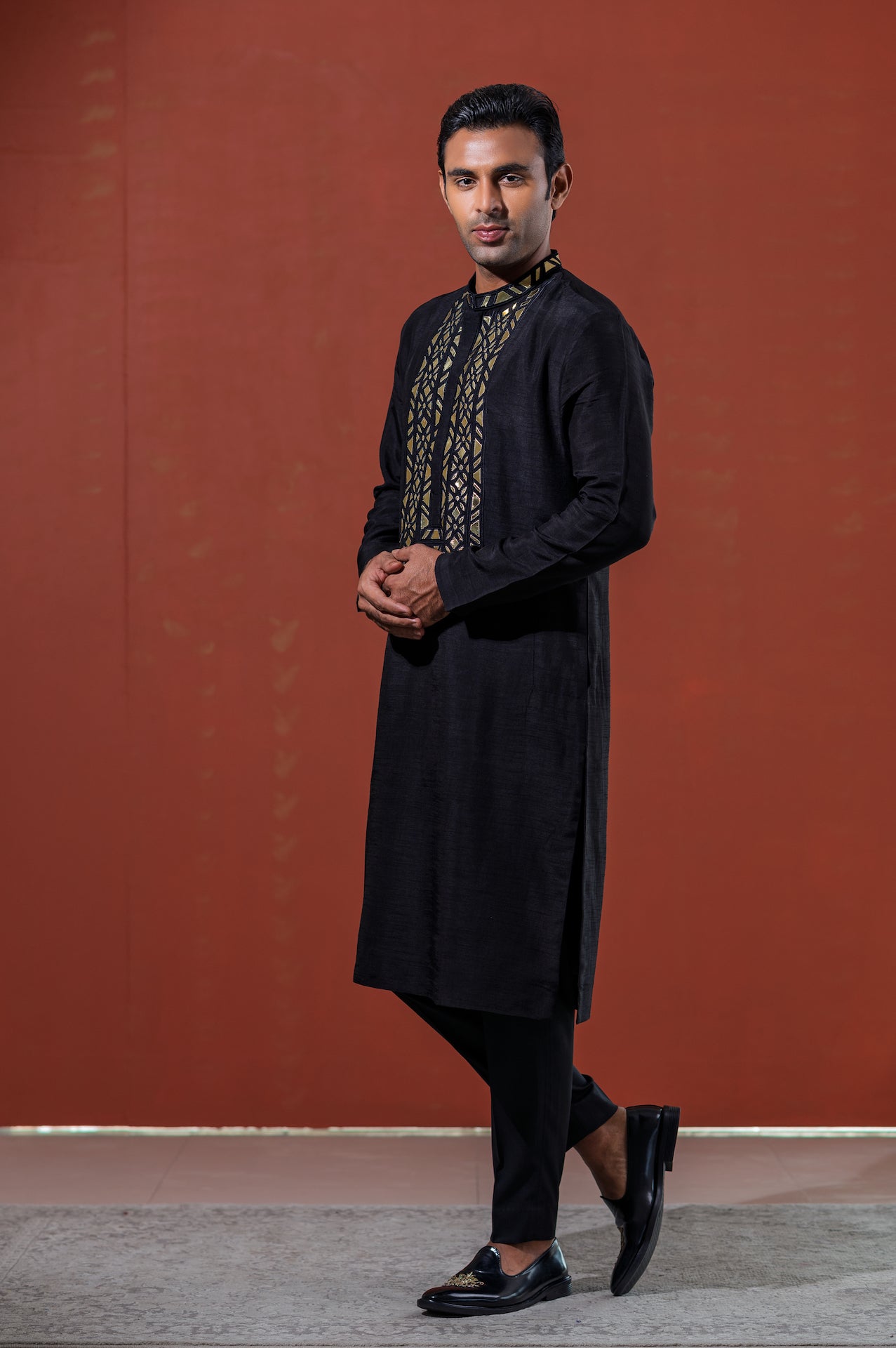 reyansh-black-kurta-gold-leather-detailing-01.jpg